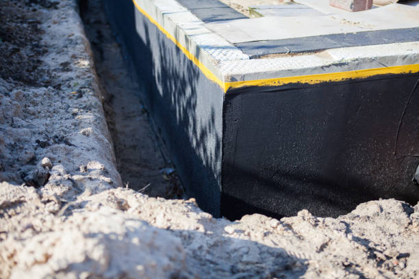 Professional Waterproofing technician working in Cloverdale, IN